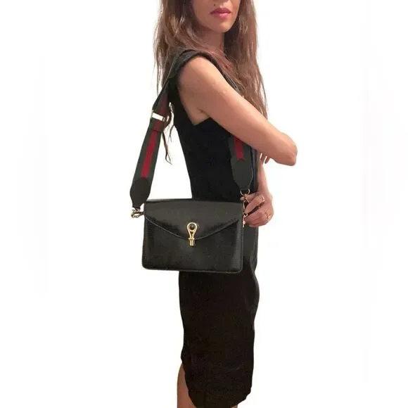 Gucci Black and Gold Leather Clutch